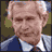 nine pixelated showing a man in a blue suit with changing text overlays and a central logo