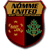 A shield-shaped emblem with a golden banner displaying unreadable text above two vertical sections: red on left, black on right. The red section contains a yellow abstract symbol; the black section shows a green tree-like shape.