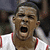 A pixelated image of a person in a white sports jersey with red trim, mouth open wide as if shouting, overlaid with red and blue text reading "Watch out" and "or joe might getcha".