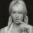 A grayscale animated sequence shows a person with light hair in two ponytails, wearing a sleeveless top, transitioning through three distinct poses against dark backgrounds.