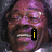 A pixelated image of a smiling person with dark hair, featuring text and symbols overlaid on the face in different frames.