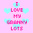 Pixelated pink text on a light purple background with cyan hearts, displaying "I LOVE MY GRANNY LOTS" in two vertical