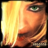 A close-up of a person with long blonde hair and green eyes, featuring the word 'MADONNA' in block letters at the bottom right.