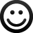 Static grayscale icon of a smiling face with two square eyes and a curved mouth inside a thick circular border.