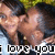 Two people embrace in a close-up photo with text "i love you" overlaid, showing slight pose changes across frames.