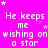 A bright pink background with white pixelated text repeating 'He keeps me wishing on a star' across multiple , surrounded by small white and light purple stars