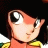 Pixelated anime-style character with large eyes and black hair, wearing a red top with yellow accents, next to text reading 'AnimeIM' and 'com' on a black background.