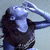 A person with long dark hair and a black top drinks from an unseen container, hands raised to the mouth in three showing slight head tilt changes