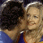 A 48x48 pixel animated buddy icon featuring a couple kissing on the left and green text reading "Original Icons .com" on the right, displayed as a contact sheet with two frames.