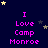 Dark blue background with scattered yellow and gray stars; repeated text "I Love Camp Monroe" in bright pink pixelated font arranged in a pattern