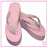 Pink flip-flops with dark purple soles and light green straps, positioned side-by-side on a white background.