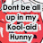 Red cartoon character with smiling face and white hat, text overlay reading 'Dont be c up in my Kool-aid Hunny' on red background.