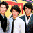 Six distinct pixelated images arranged in a , featuring individuals with dark hair and various poses against different backgrounds