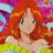Pixelated anime-style character with long red hair and green eyes, wearing a green and yellow dress, against a colorful abstract background with text reading 'AnimeIM' and 'COM' on black