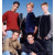 Group of six people in casual clothing against a blue sky background with 'DREAM STREET' text on the right side.