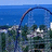 Pixelated image split into four quadrants with a roller coaster scene and blue text on black backgrounds.