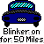 Two pixelated blue taxi icons side-by-side on gray background, one with red blinker light visible.