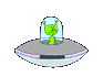 Green alien in clear dome atop gray flying saucer with pink trim, showing multiple poses including raised arms and side views.