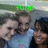 Four people pose together outdoors with green text above them changing from 'funn' to 'in the' to 'sun'
