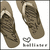 Brown flip-flops with textured soles and light-colored straps, displayed in a on white background