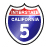 Shield-shaped icon with red top section, blue middle section containing white text and number 5, black border, pixelated rendering.
