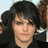 A pixelated image shows a person with dark hair and a black jacket on the left, next to red text reading 'Gerard Way' on a black background.