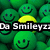 Green smiley face icons fill the background with one yellow smiley face, overlaid with text reading "Da Smileyzz" and "Rox!" on black bars.