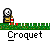 Pixel art animation of a cartoon character with a skull face and brown body standing on green grass, holding red-and-white striped poles while text below reads 'Croquet' in white.