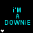 A static digital image displays cyan text 'i'M A DOWNiE' on a black background with white asterisks in varying quantities and positions.