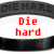 A circular icon with a black ring displaying 'DIEHARD' text, featuring red and black pixelated 'Die hard' text on white background across three visible frames.