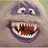 A pixelated cartoon face with wide eyes and a large open mouth showing teeth, accompanied by the text "he's my bff" on the right side.