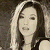 A split-frame contact sheet showing a grayscale portrait of a woman on the left and green pixelated text on a dark background on the right.