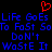 Red pixelated heart symbol above blue text reading 'Life Goes Fast So Don't Waste It' on black background.