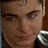 Pixelated image of a person with dark hair and light skin, accompanied by pink pixelated text reading "Im in love with LINK LARKIN <3" on white background.