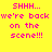 Yellow background with pink pixelated text reading 'SHHH... we're back on the scene!!!' repeated in a