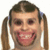 Pixelated image of a person with brown pigtails and red eyes, smiling widely next to black text reading "LoL" on white background.