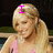 A four- shows a blonde woman in a pink top with text overlays changing