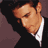 six pixelated images showing a person in formal attire with subtle facial expression changes across frames