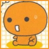 Orange cartoon character with large black eyes, a single white tooth, and a small sweat drop on its head, standing on a yellow oval shape against a yellow grid background.