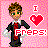 Pixel art buddy icon featuring a cartoon character with green eyes and brown hair against a pink background, holding a red heart symbol next to text reading "FREPS!" in bold red letters.