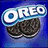 Blue background with pixelated white text and heart borders, featuring Oreo cookies in the top-left corner.