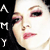 A four- of a person's face with pink eyeshadow and red lips, set against a black background with white stylized text repeating 'AMY' vertically