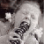 A four- shows a black-and-white animated sequence of a person holding an object, with two text below displaying 'next time try' and 'Mioi OREO'