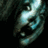 A pixelated image of a metallic face with glowing eyes and mouth, set against dark background, next to text reading "Movie Vs Movie" on light green and gray