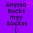 Purple background with black pixelated text reading 'Anysso Rocks myy Sockss' and a pink heart symbol above the first 'o', followed by a colon-parenthesis emoticon.