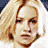 A 48x48 pixel animated contact sheet showing three sampled frames of a blonde woman with varying facial expressions and poses against solid backgrounds.