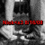 Pixelated grayscale image of a person with dark hair and light clothing, overlaid by red digital text reading "Held 03 B1609".