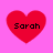 Four red heart shapes on a pink background, each containing the text 'Sarah' in black pixelated font.