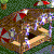 Pixelated image of a brown wooden structure with red accents and purple light effects against a green background.