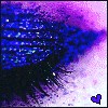 Pixelated close-up of an eye with long dark lashes, blue and purple iridescent background, and a small blue heart in the bottom-right corner.